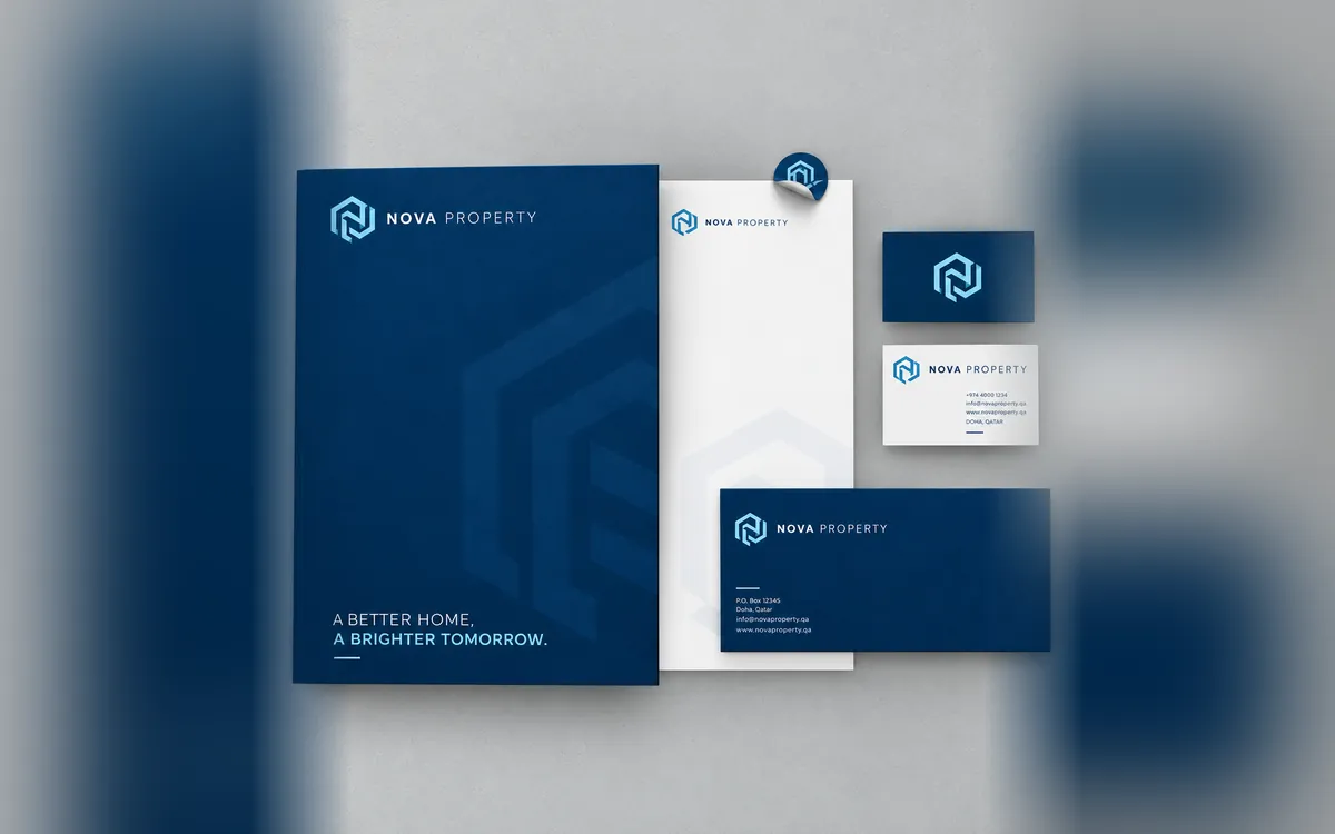 NOVA Property folder, letterhead and business cards in navy